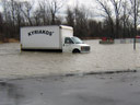 Truck in Flooded Parking Lot